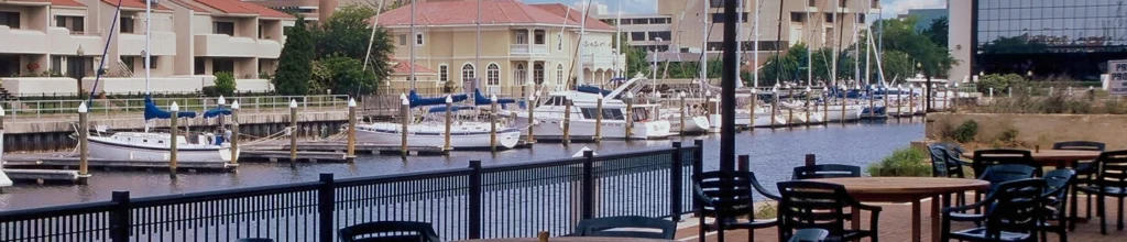 Waterfront marina and outdoor seating area in downtown Pensacola, Florida